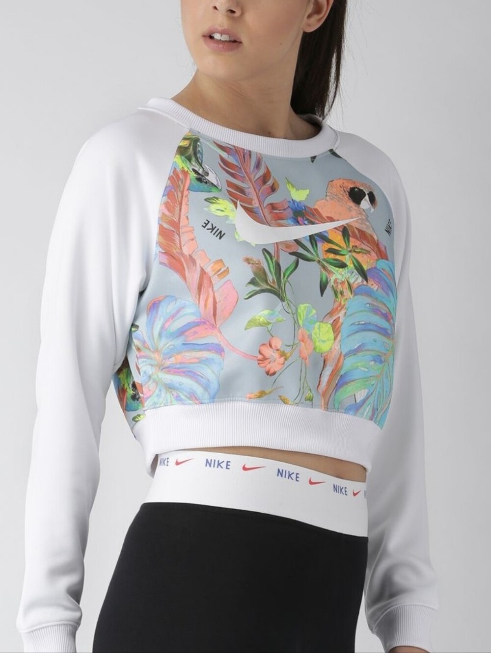 NIKE | Hyper Femme Tropical Print Crop Sweatshirt featuring a Vibrant Floral